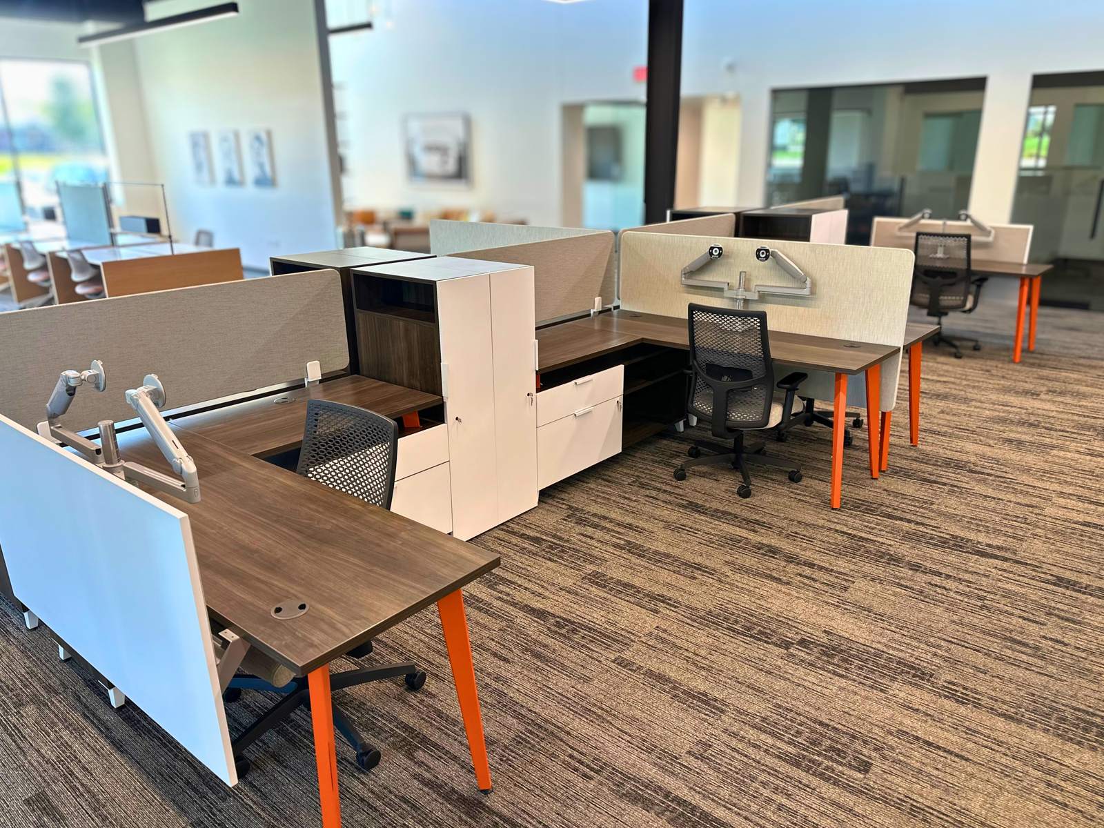 Dedicated desk pods with dividers on the coworking floor at SpringPad in Lincoln, Nebraska